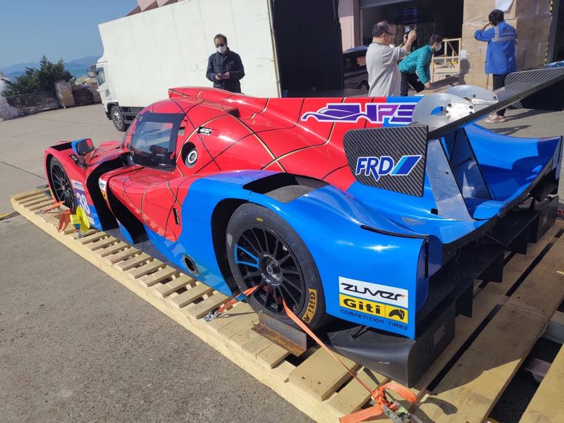 Prototype endurance race car on a shipping pallet